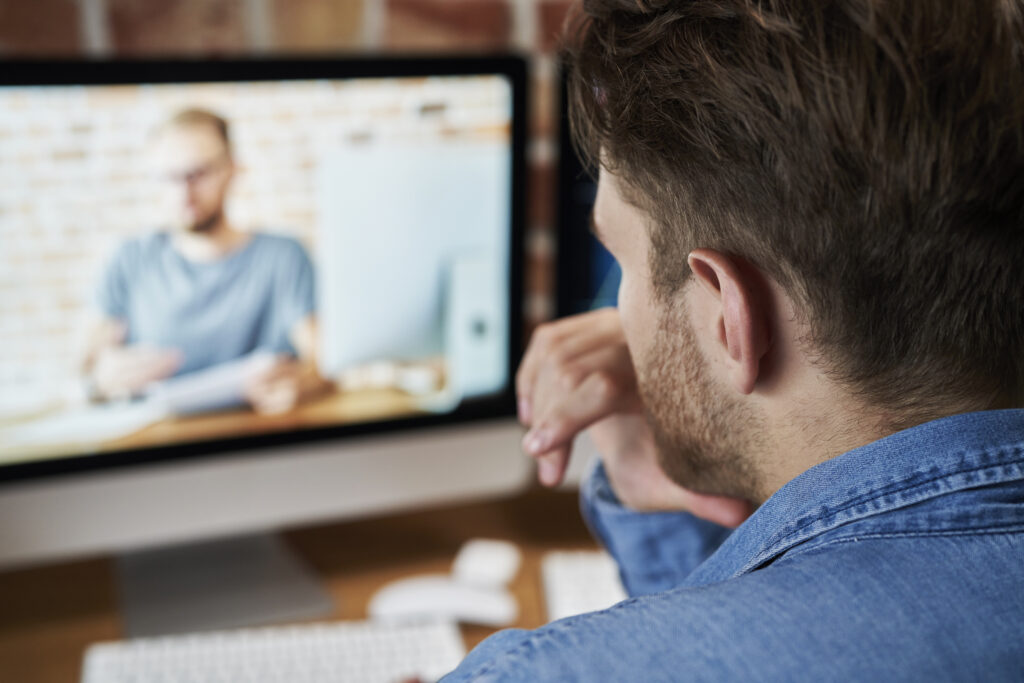 A person is taking online class to learn useful skills for career development and job success.