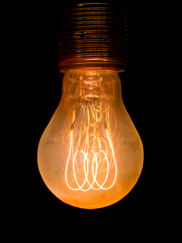 A glowing light bulb representing skills and innovation, symbolizing the real reason many graduates remain jobless after earning their degree
