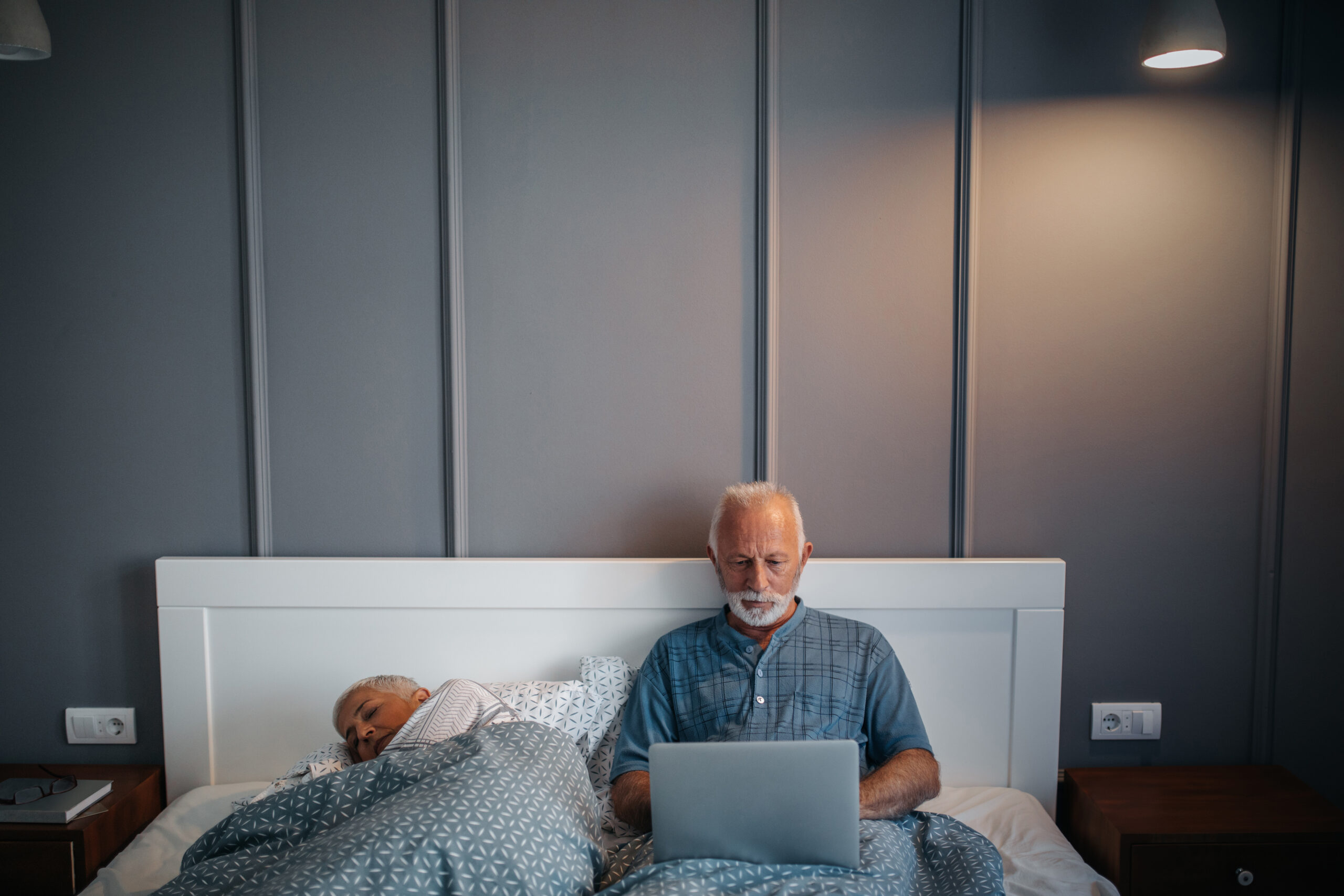 Older man working from home on laptop